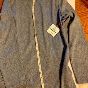 A sweater silver heather color 58% cotton 38% polyester 4% ElASTANE